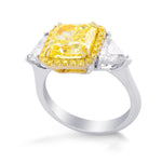Fancy Intense Yellow Radiant and Triangle Halo Diamond Ring