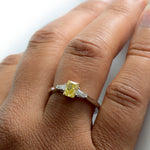 Fancy Intense Yellow Radiant and Taper Diamond Ring