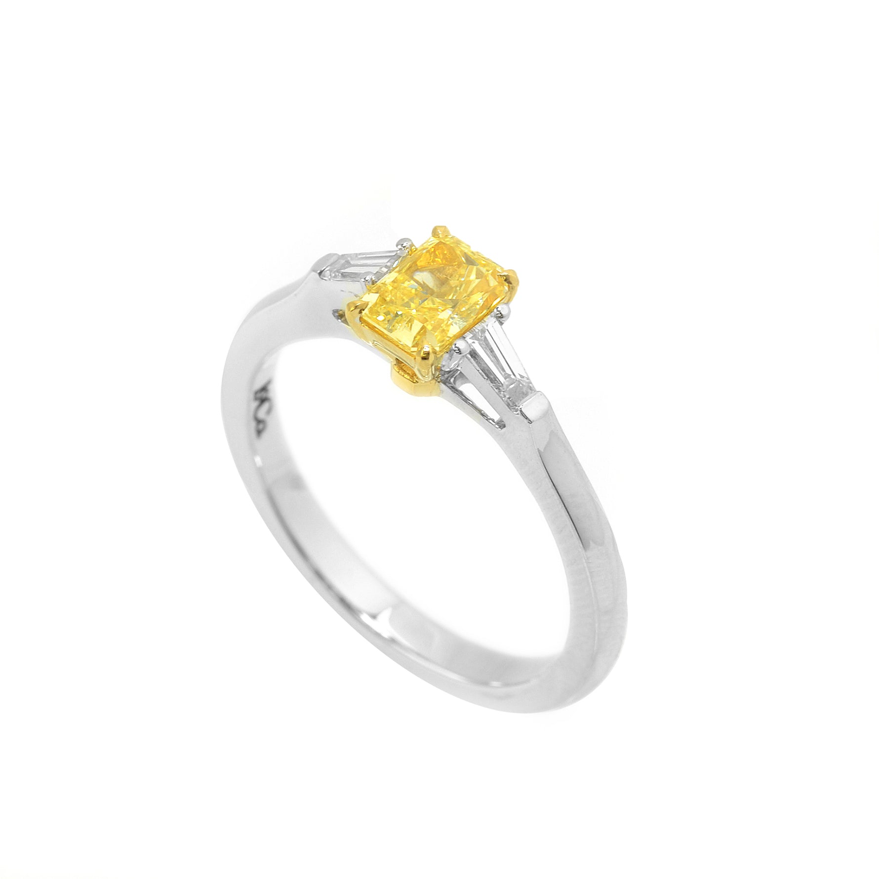 Fancy Intense Yellow Radiant and Taper Diamond Ring