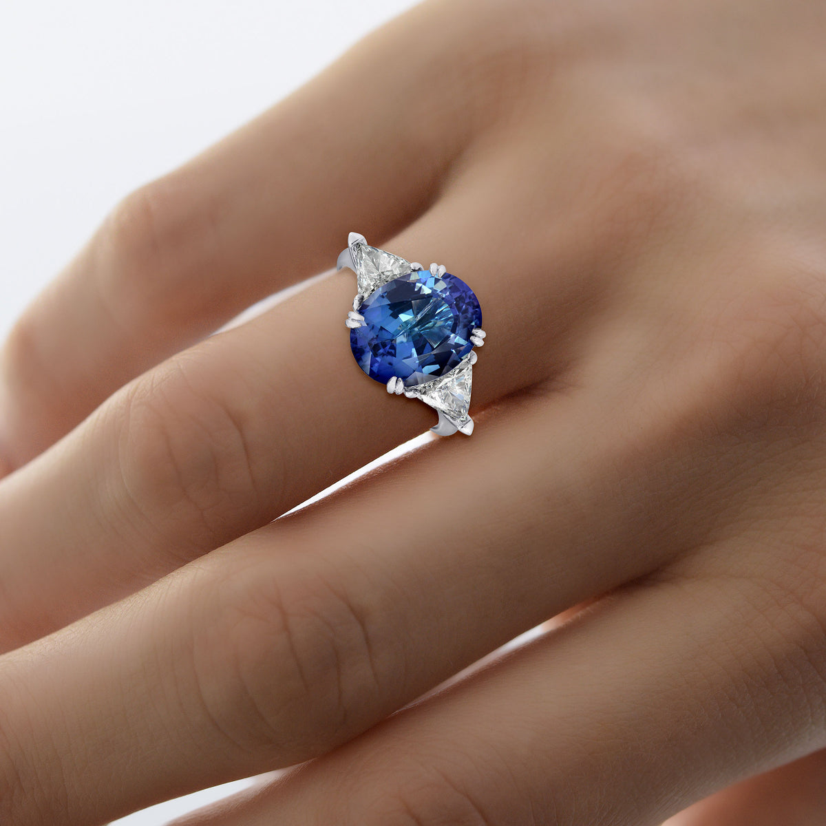 Oval Tanzanite and Triangle Diamond Ring
