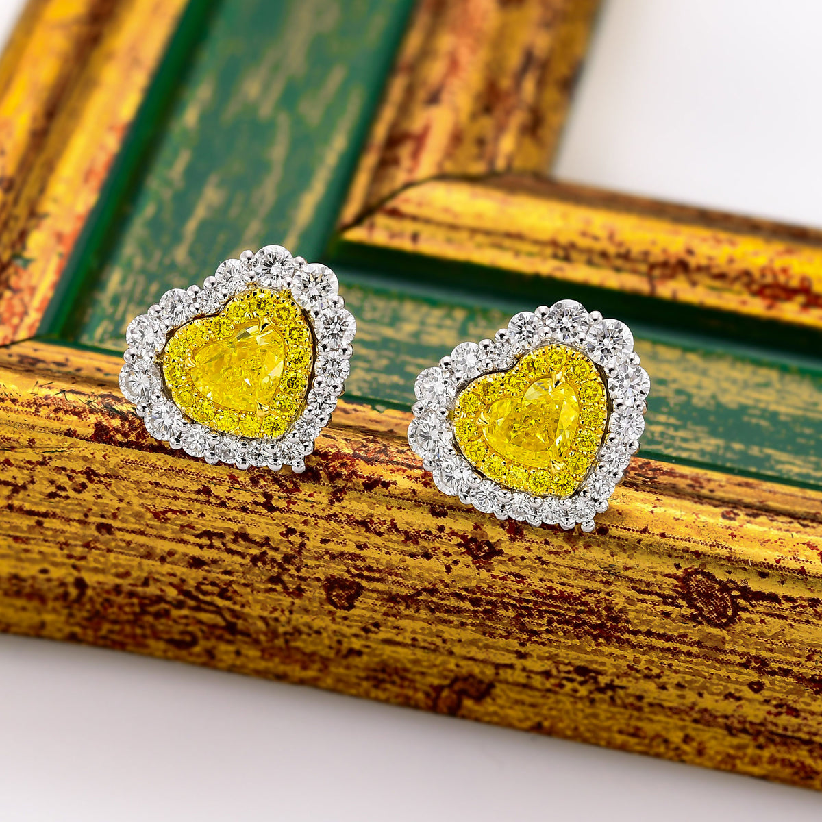 Fancy Vivid Yellow Heart Shape Double Halo Diamond Earrings