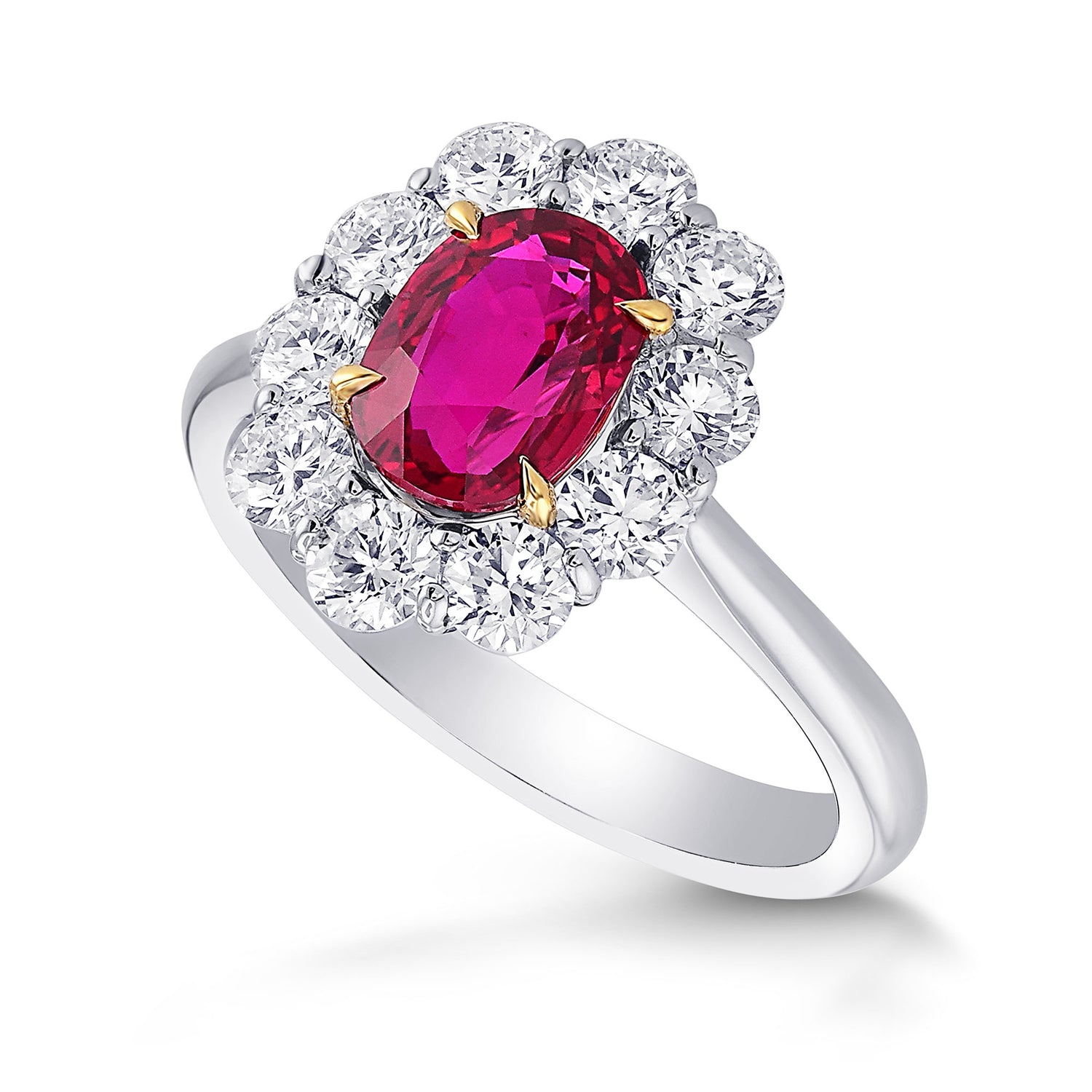   Oval Mozambique Red Ruby and Diamond Halo Ring.