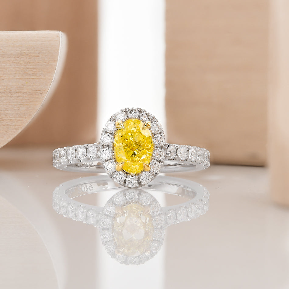 Fancy Intense Yellow Oval Diamond Halo Ring