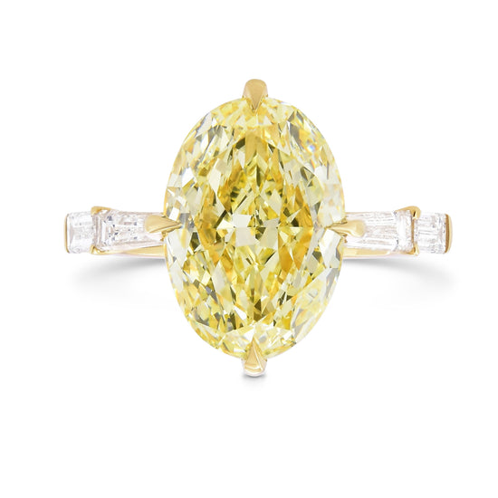 Fancy Yellow Oval Diamond Side-stone Ring