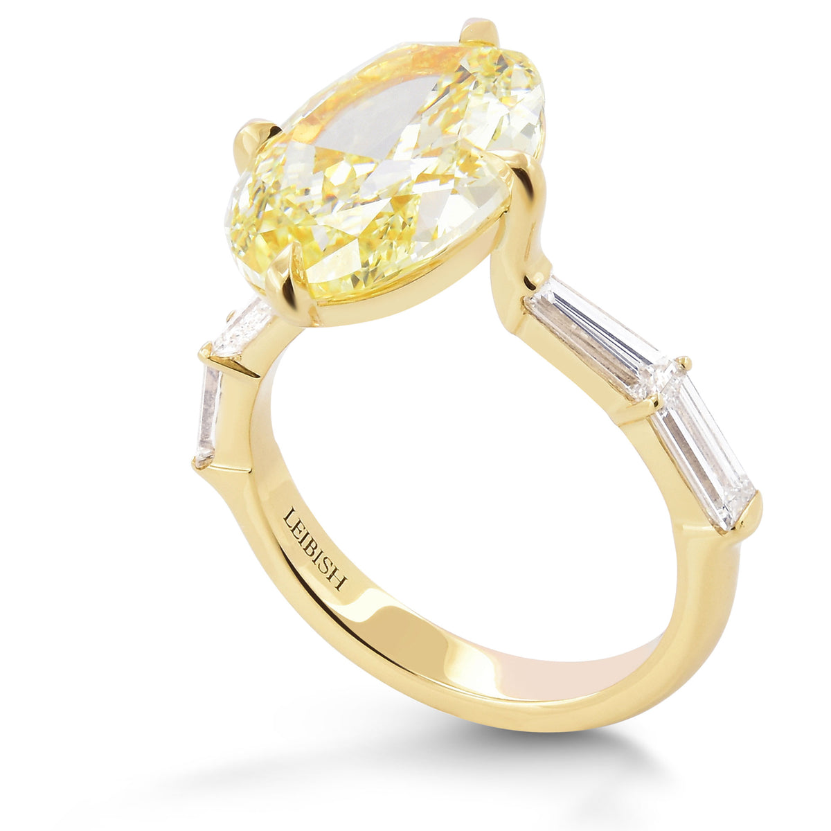 Fancy Yellow Oval Diamond Side-stone Ring