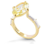 Fancy Yellow Oval Diamond Side-stone Ring