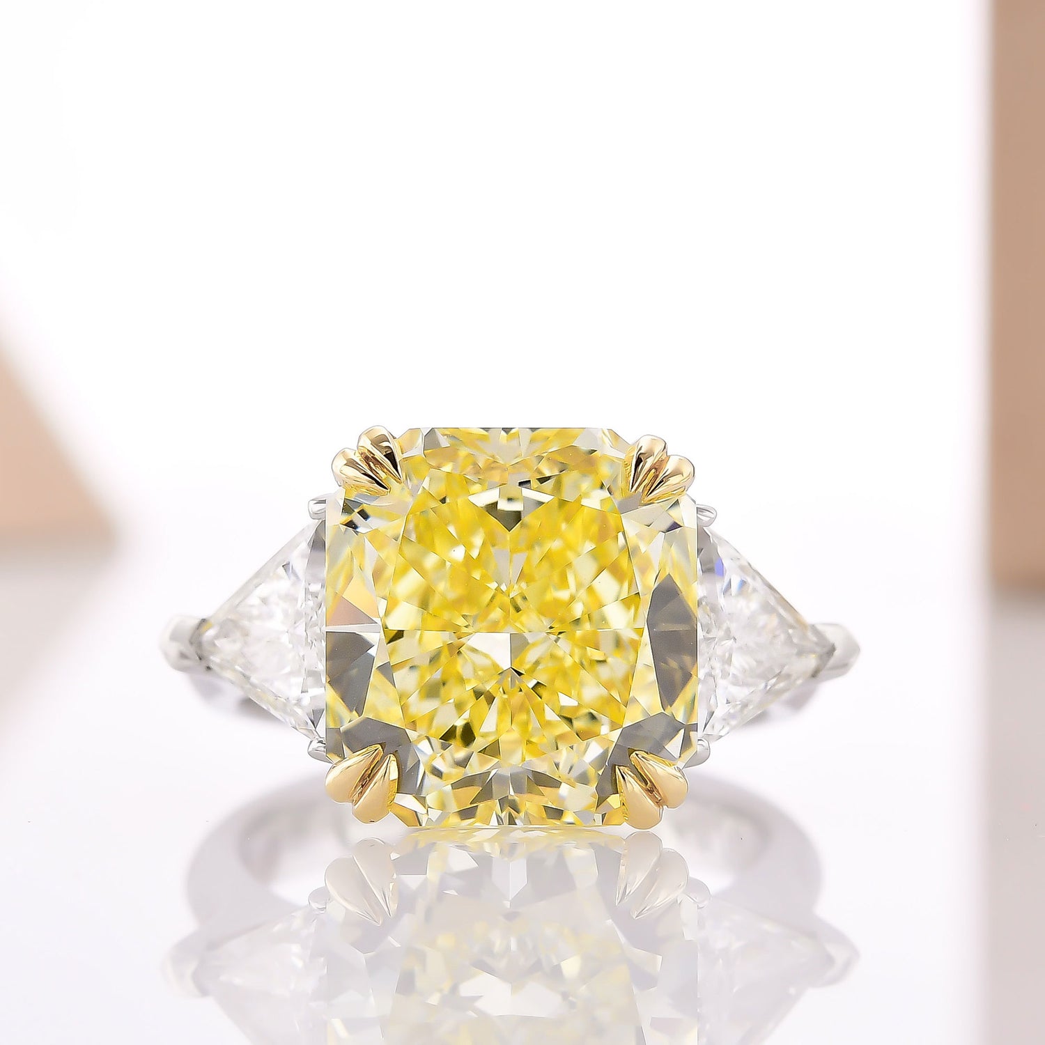 Fancy Intense Yellow Radiant and Triangle 3 Stone Diamond Ring