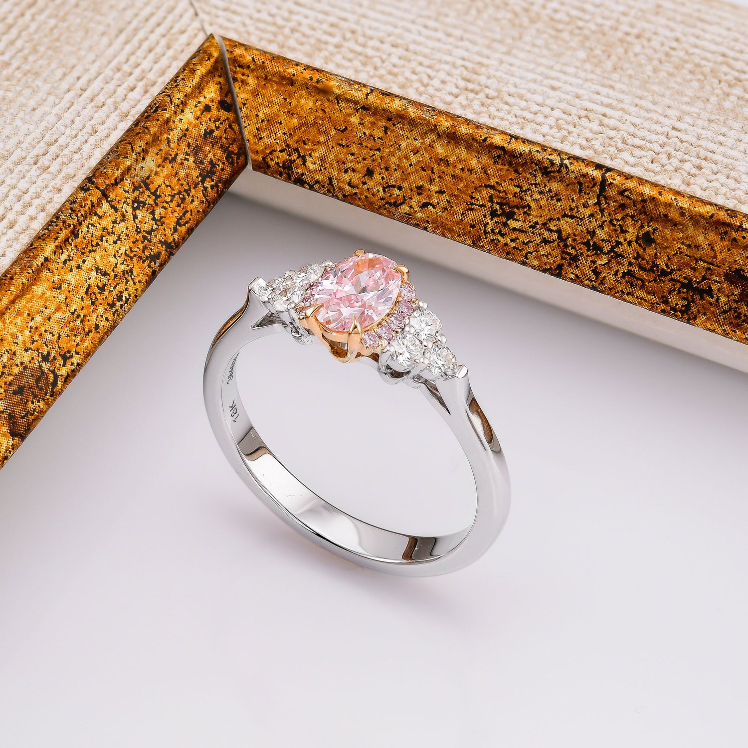 Fancy Intense Pink Oval Diamond Side Stone Ring