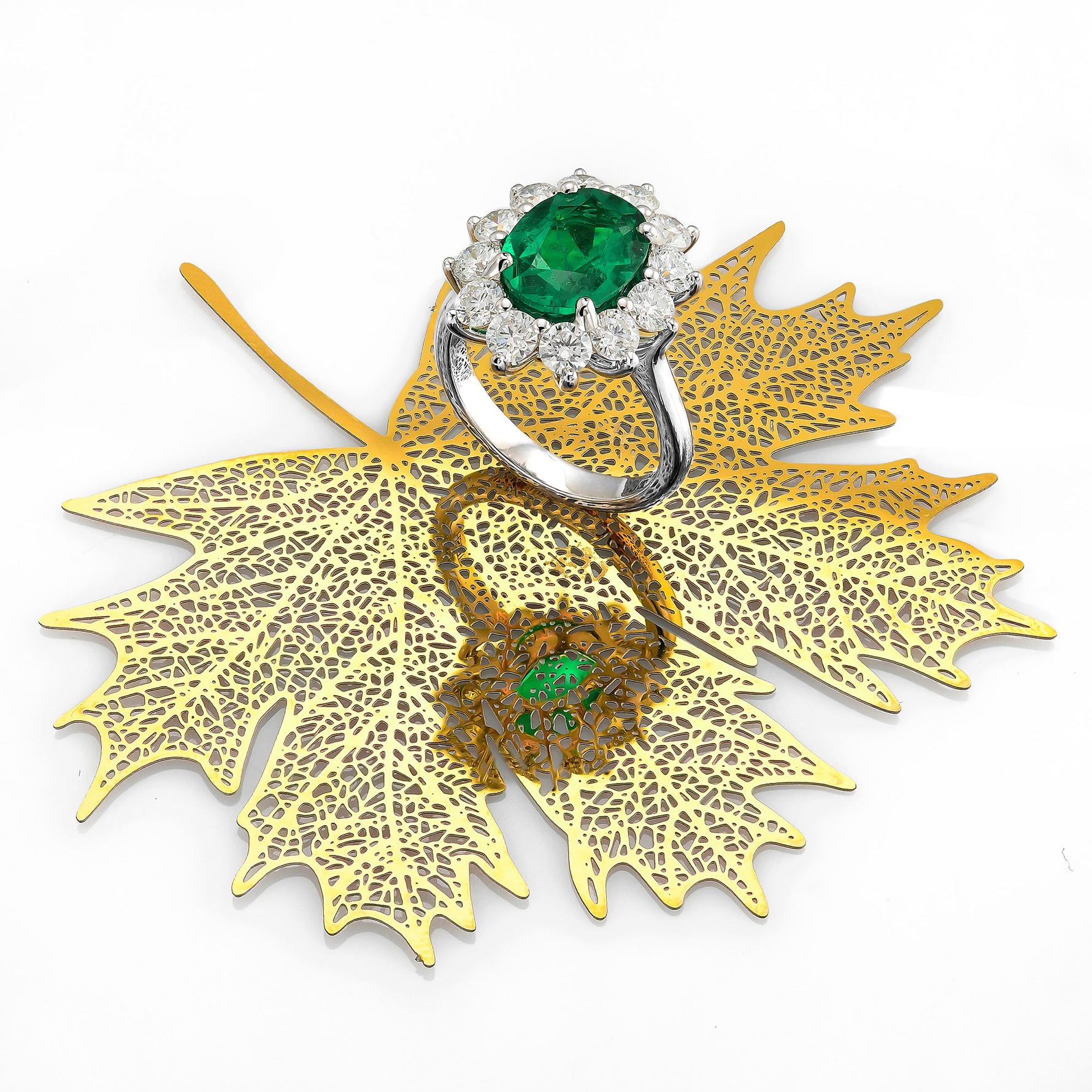  Oval Green Emerald and Diamond Halo Ring