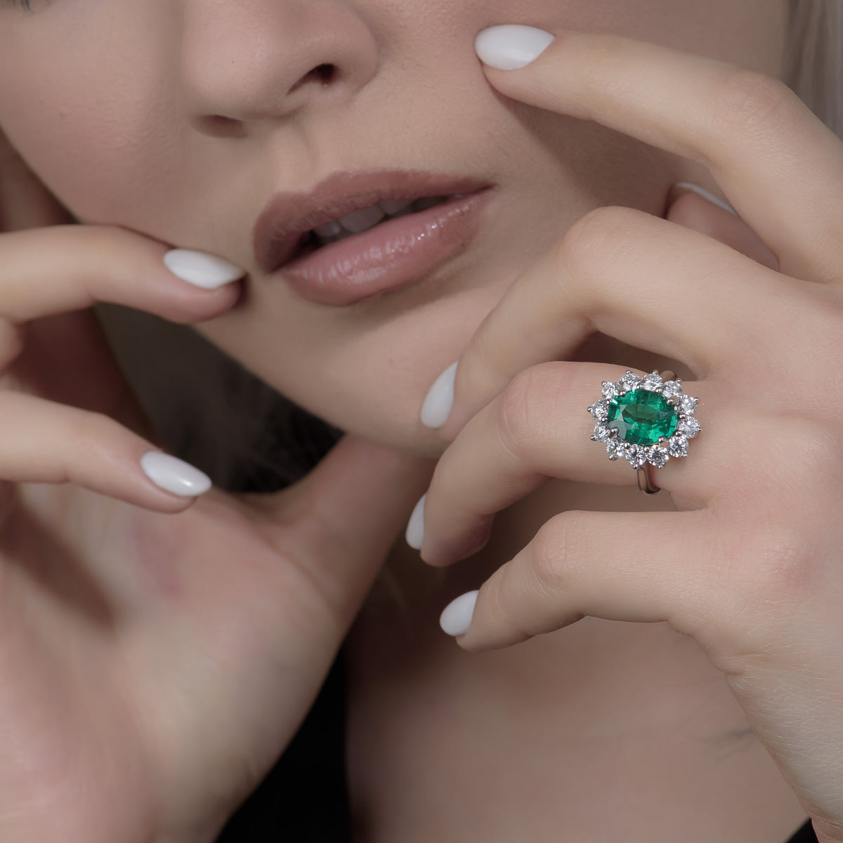  Oval Green Emerald and Diamond Halo Ring