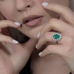  Oval Green Emerald and Diamond Halo Ring