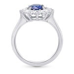  Blue Sapphire Oval and Diamond Halo Ring