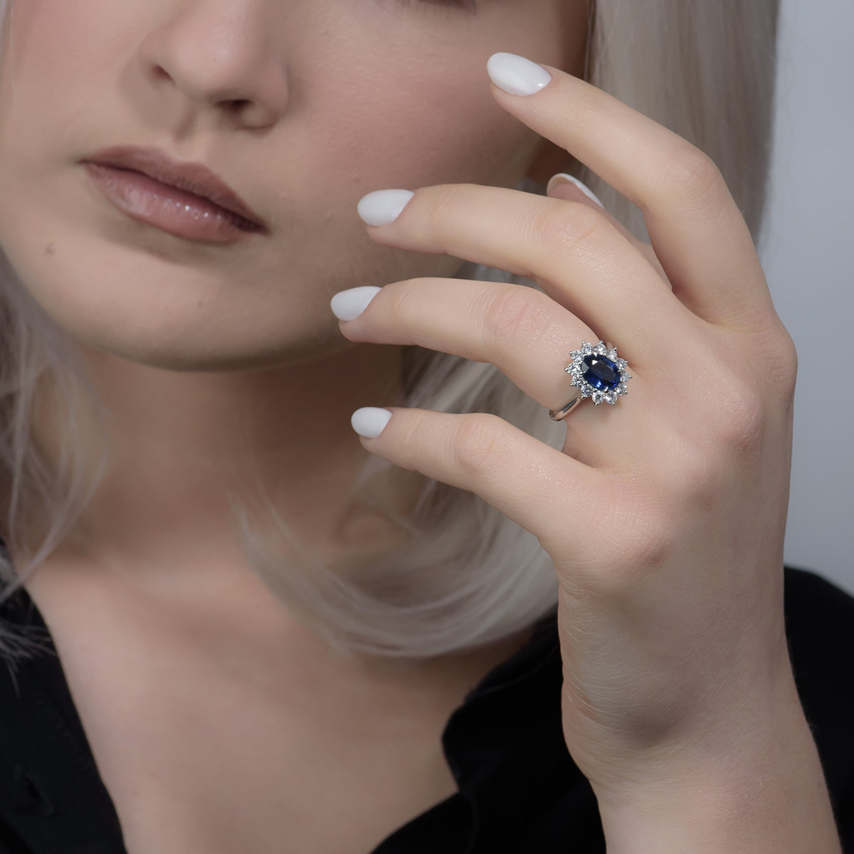  Blue Sapphire Oval and Diamond Halo Ring