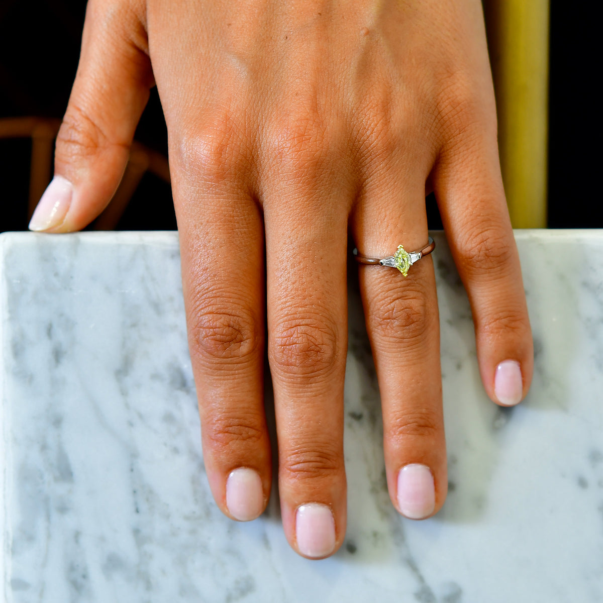 Fancy Yellow Marquise and Taper Diamond Ring set in 18K gold