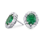 Extraordinary Oval Emerald and Diamond Halo Earrings