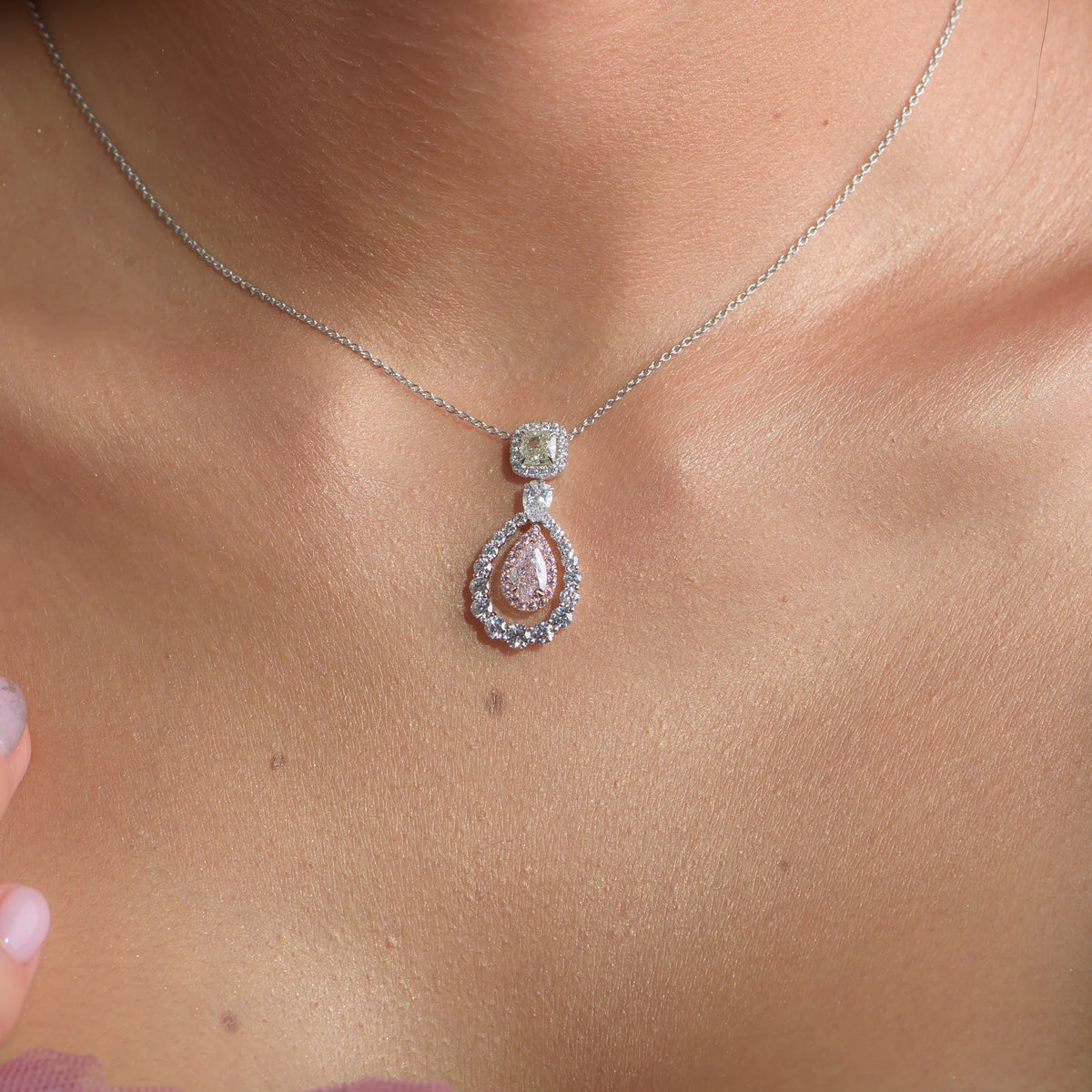 Light Pink Pear and Fancy Yellow Green Cushion Double Halo Drop Diamond Pendant