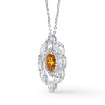 Extraordinary Fancy Deep Yellowish Orange Marquise Double Halo Diamond Pendant.