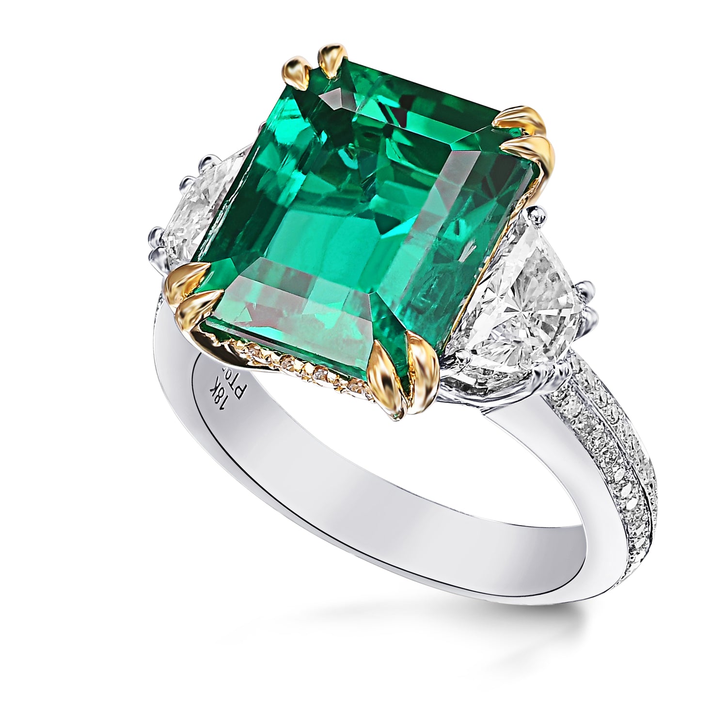 Emerald and Trapezoid Side Stone Diamond Ring