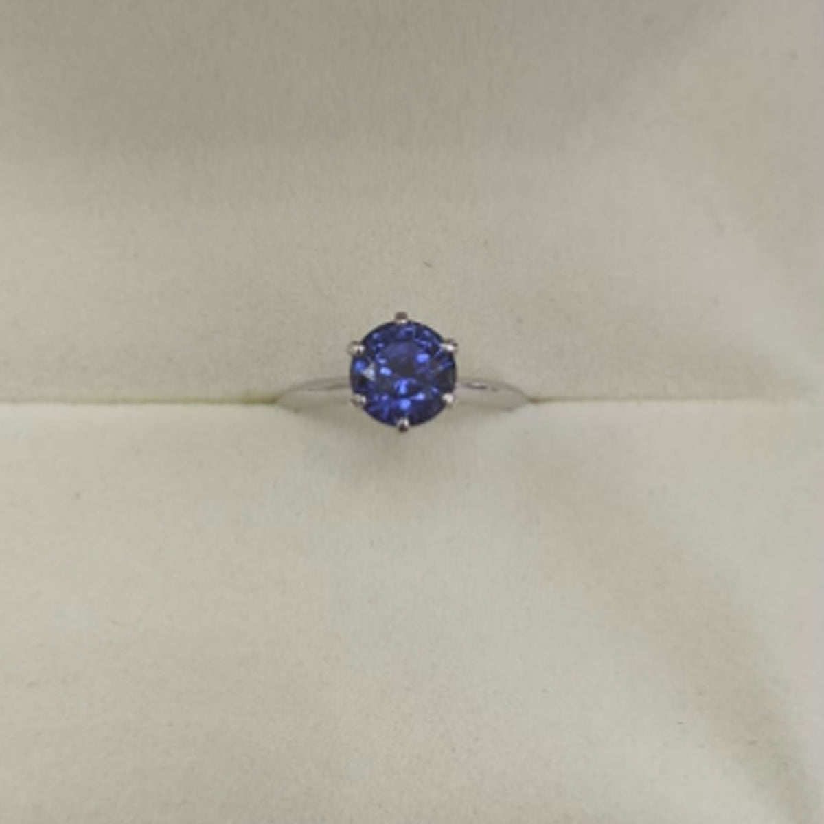Round Blue Sapphire Solitaire Diamond Ring