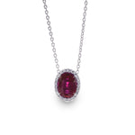 Oval Ruby and Diamond Halo Pendant