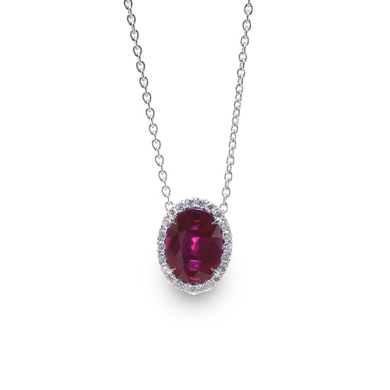 Oval Ruby and Diamond Halo Pendant