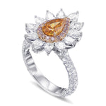 Fancy Vivid Yellowish Orange Pear Extraordinary Diamond Ring