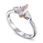 Fancy Pinkish Purple and Colorless Pear Three Stone Diamond Ring