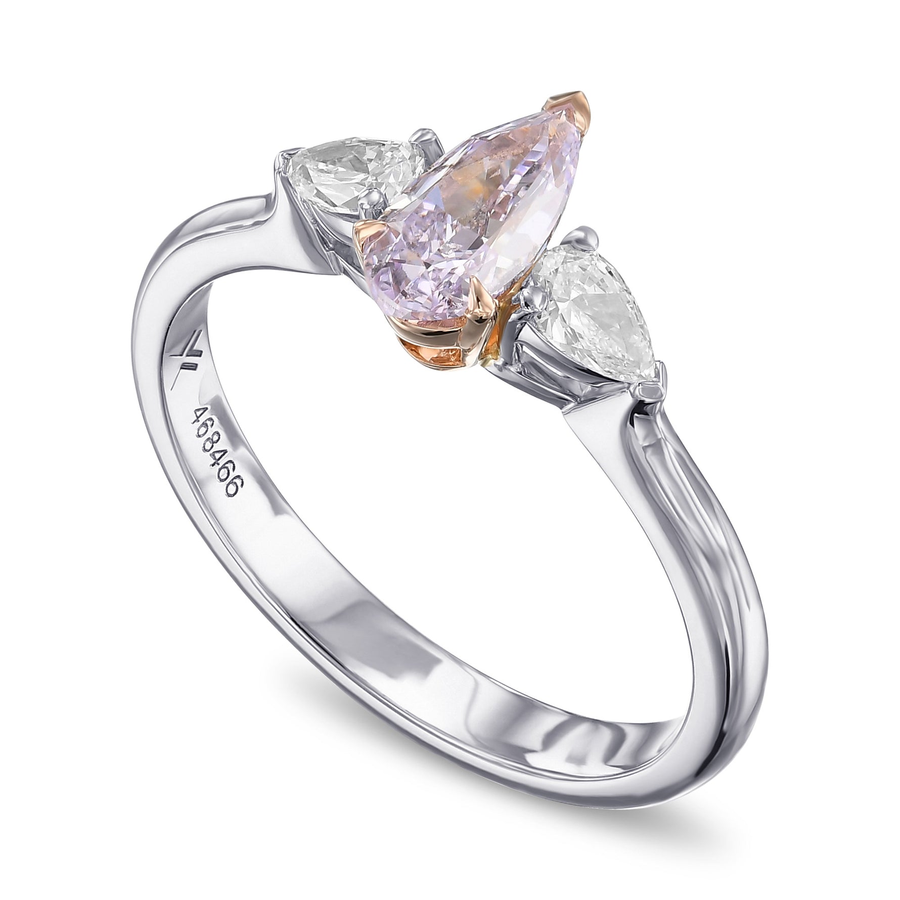Fancy Pinkish Purple and Colorless Pear Three Stone Diamond Ring