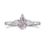 Fancy Pinkish Purple and Colorless Pear Three Stone Diamond Ring