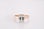 Colorless Emerald Cut Solitaire Diamond Ring