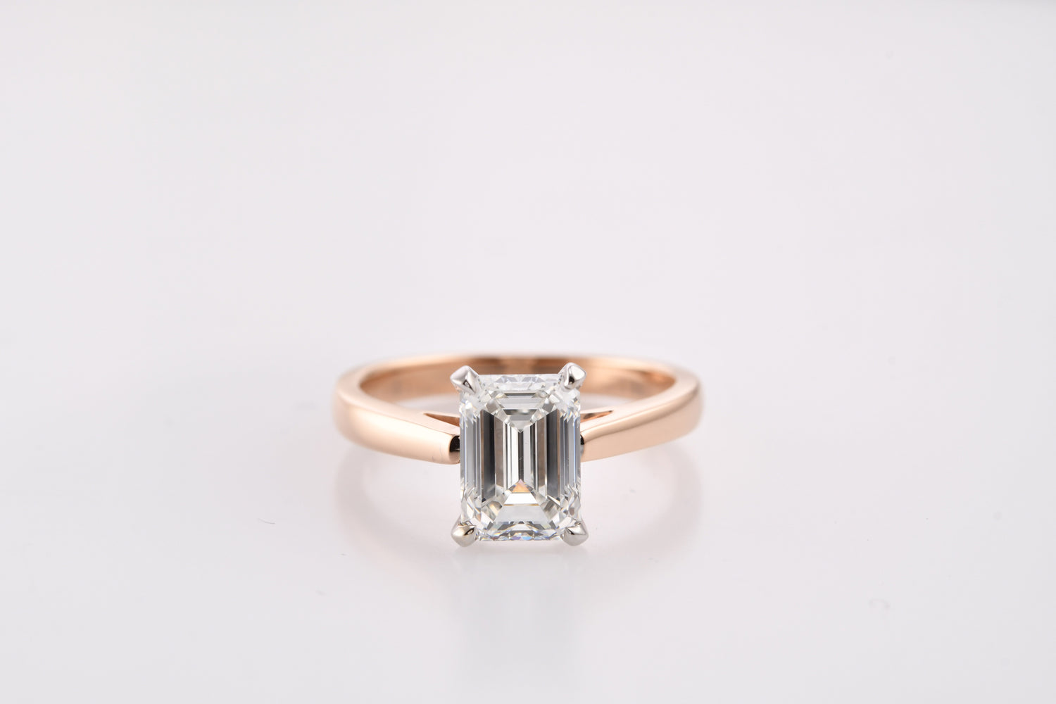 Colorless Emerald Cut Solitaire Diamond Ring