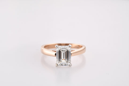 Colorless Emerald Cut Solitaire Diamond Ring