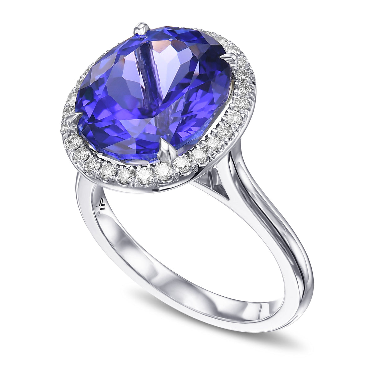 Oval Tanzanite and Diamond Halo Ring