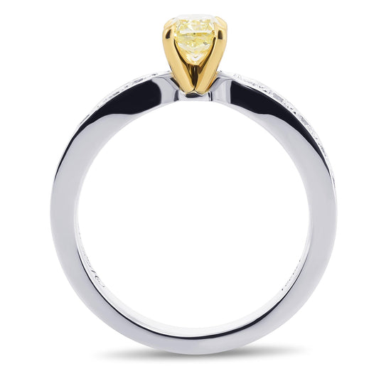 Fancy Light Yellow Radiant Side-stone Diamond Ring
