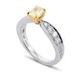 Fancy Light Yellow Radiant Side-stone Diamond Ring