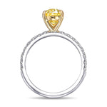 Fancy Vivid Yellow Oval Side Stone Diamond Ring