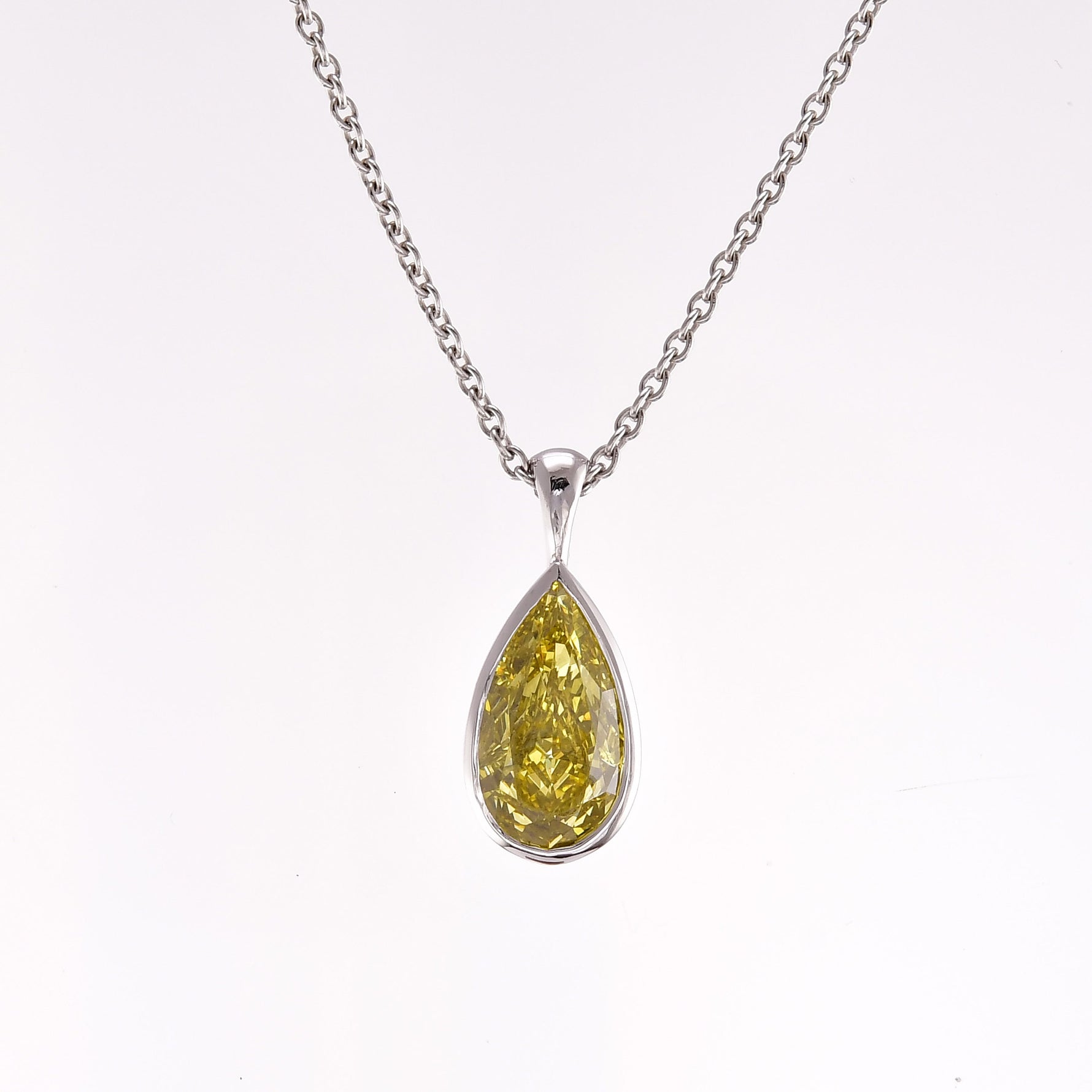 Fancy Vivid Yellow Pear Solitaire Diamond Pendant