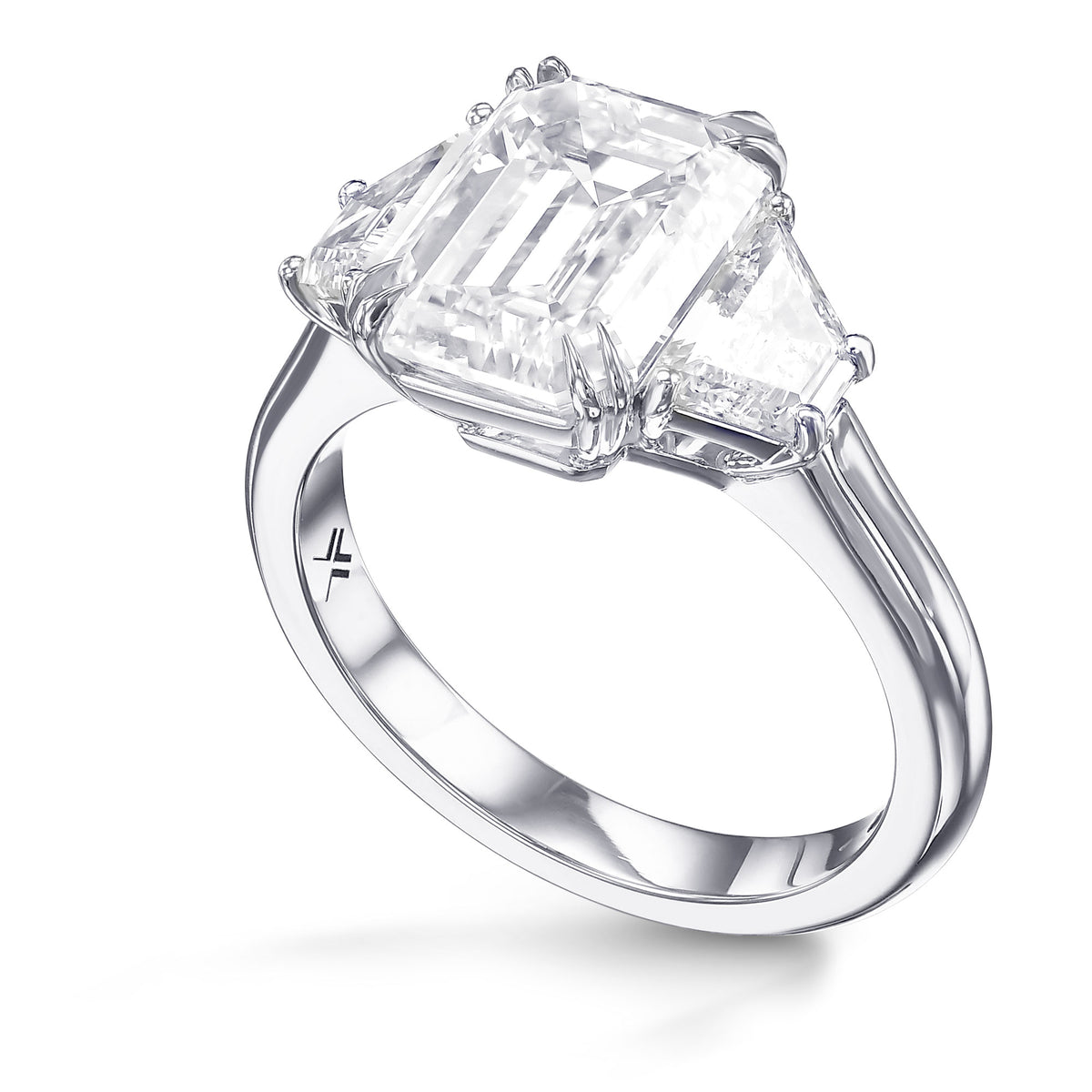 Emerald and Trapezoid 3-stone White Diamond Ring