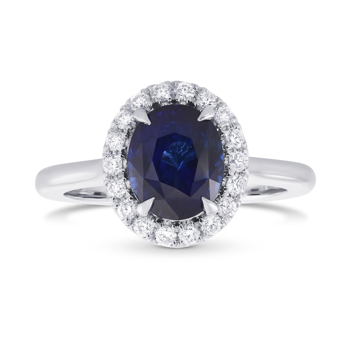 Oval Royal Blue Sapphire and Diamond Halo Ring