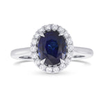 Oval Royal Blue Sapphire and Diamond Halo Ring