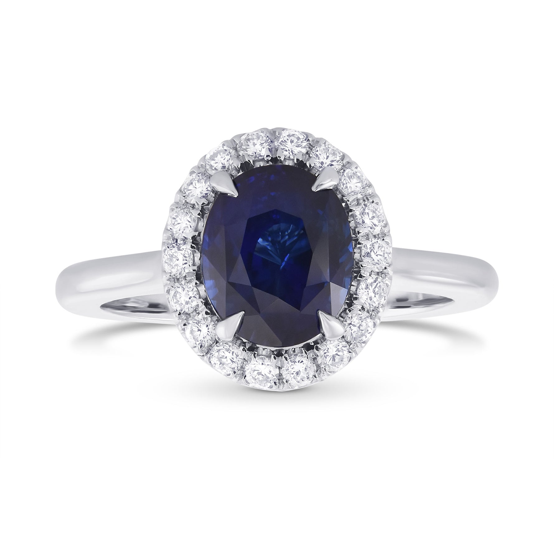 Oval Royal Blue Sapphire and Diamond Halo Ring