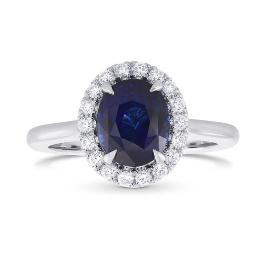 Oval Royal Blue Sapphire and Diamond Halo Ring