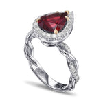 Pear Ruby Regal Halo Engagement and Wedding Ring Set