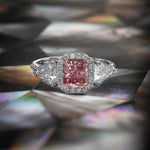 Fancy Intense Pink Radiant 3 stone Halo Diamond Ring