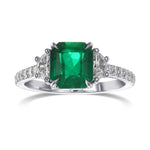 Emerald and Half Moon Diamond Side-stone Ring