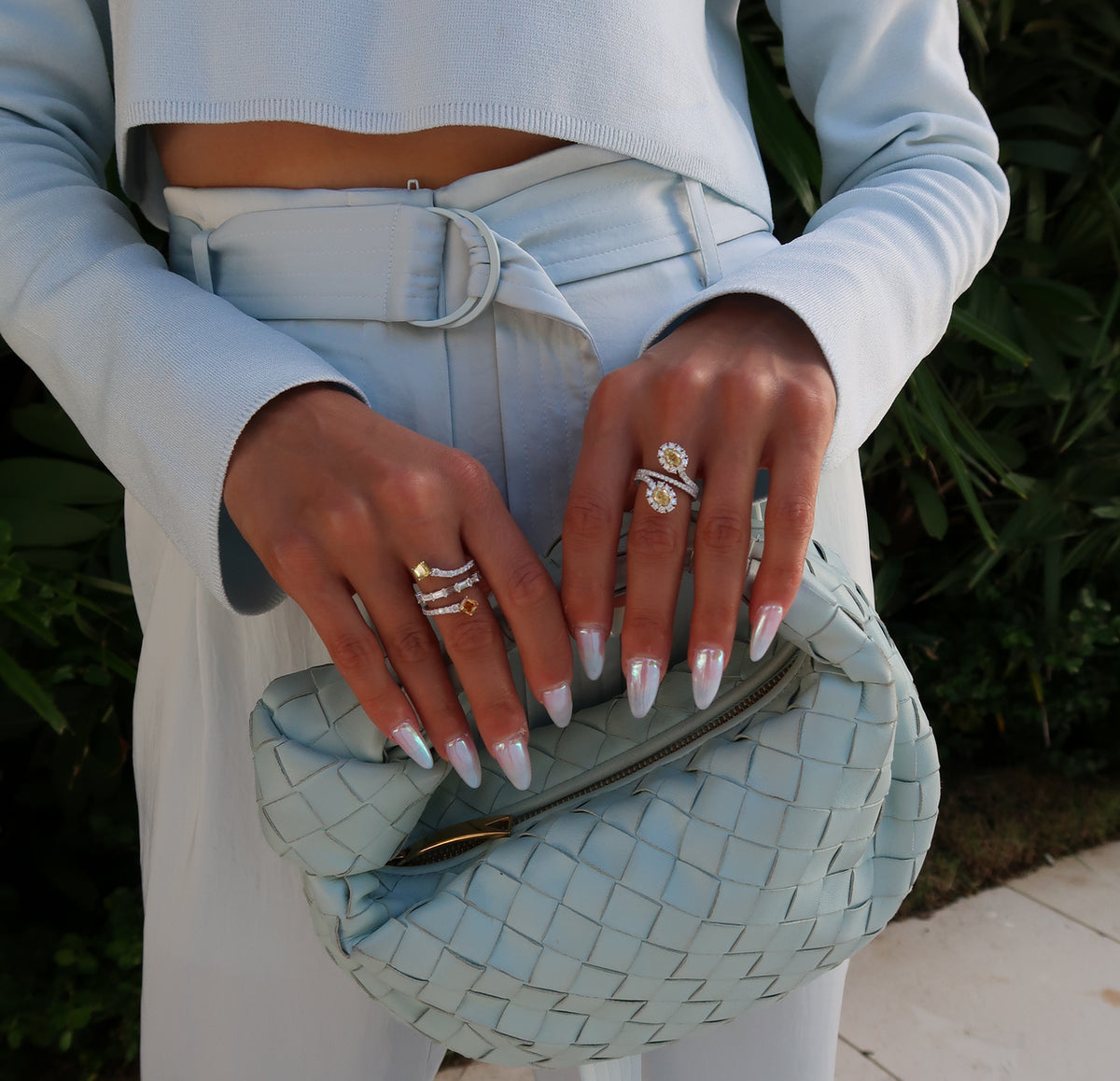 Fancy Intense Yellow Oval Two Stone Halo Diamond Crossover Ring