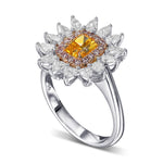 Fancy Vivid Yellowish Orange Radiant Halo Diamond Ring