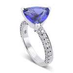Trilliant Tanzanite Side-stone Ring