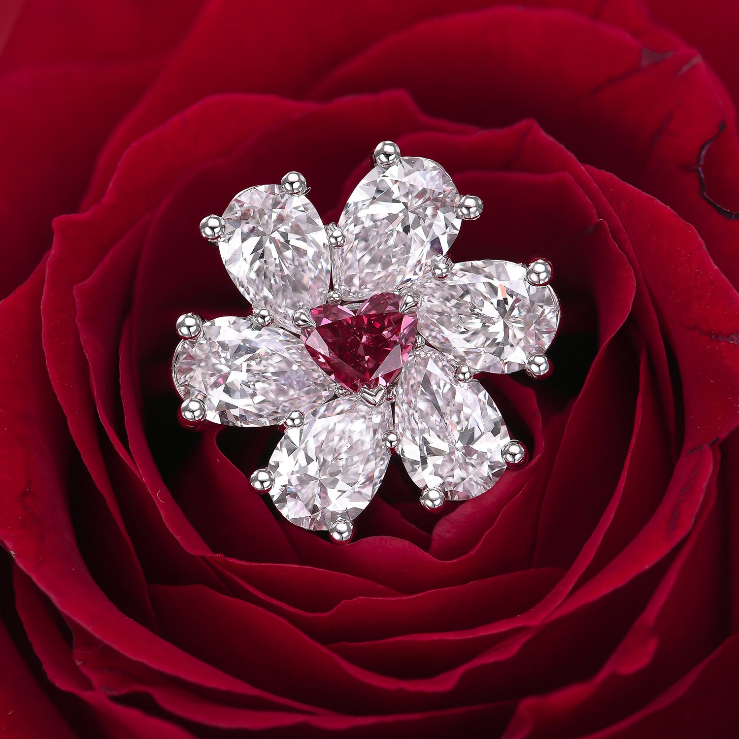 Extraordinary Fancy Purplish Red Heart and Pear Diamond Ring