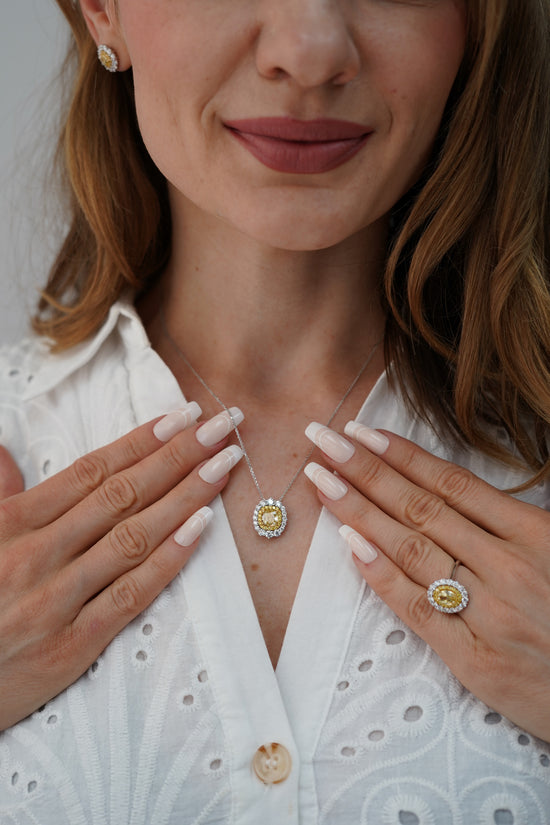 Fancy Intense Yellow Oval Double Halo Diamond Ring